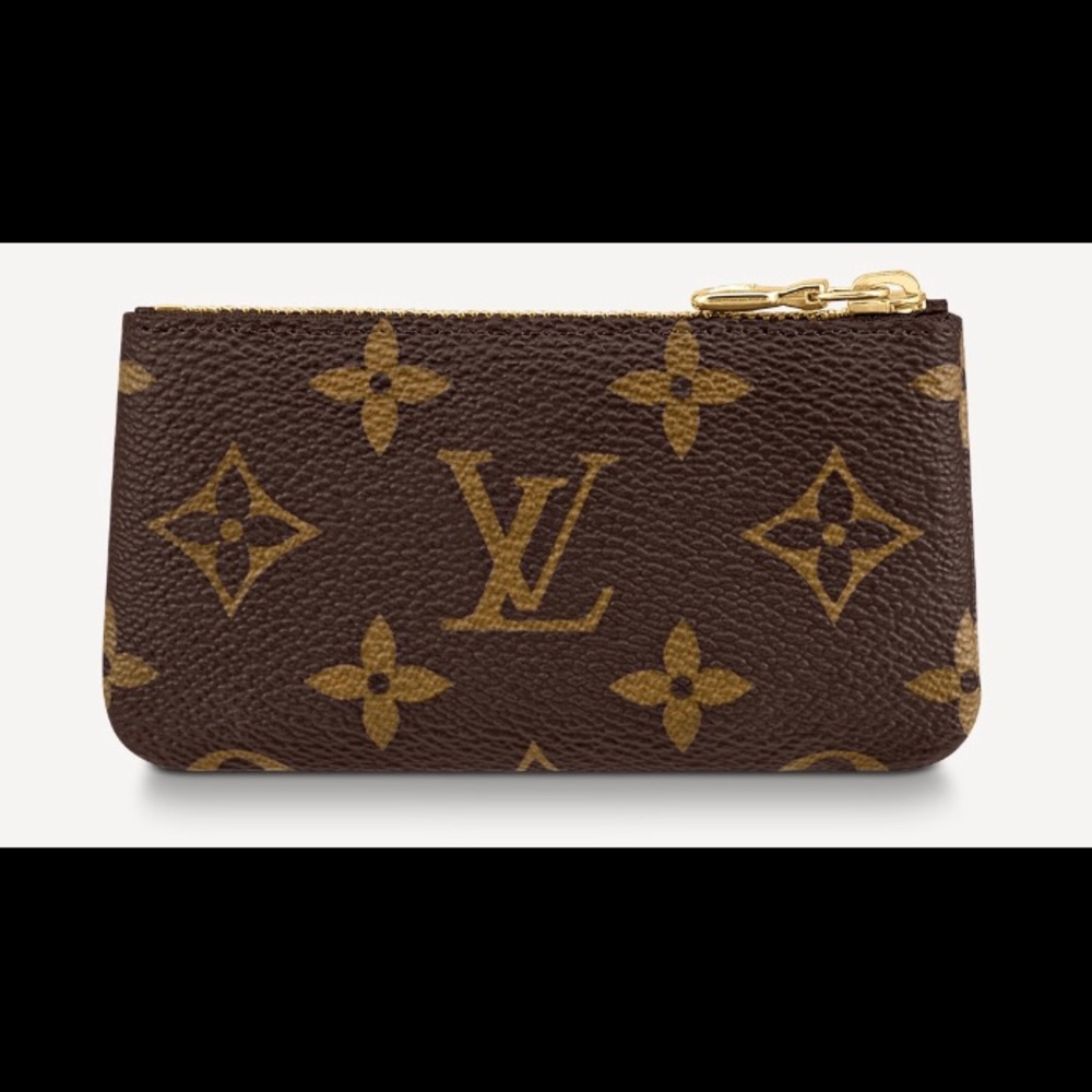 The Key Pouch in iconic Monogram by Louis Vuitton. Brand new with dust bag, box